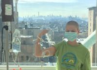Jenna Strickland poses wearing a mask at the Bone Marrow Transplant Unit at NYP/Columbia.